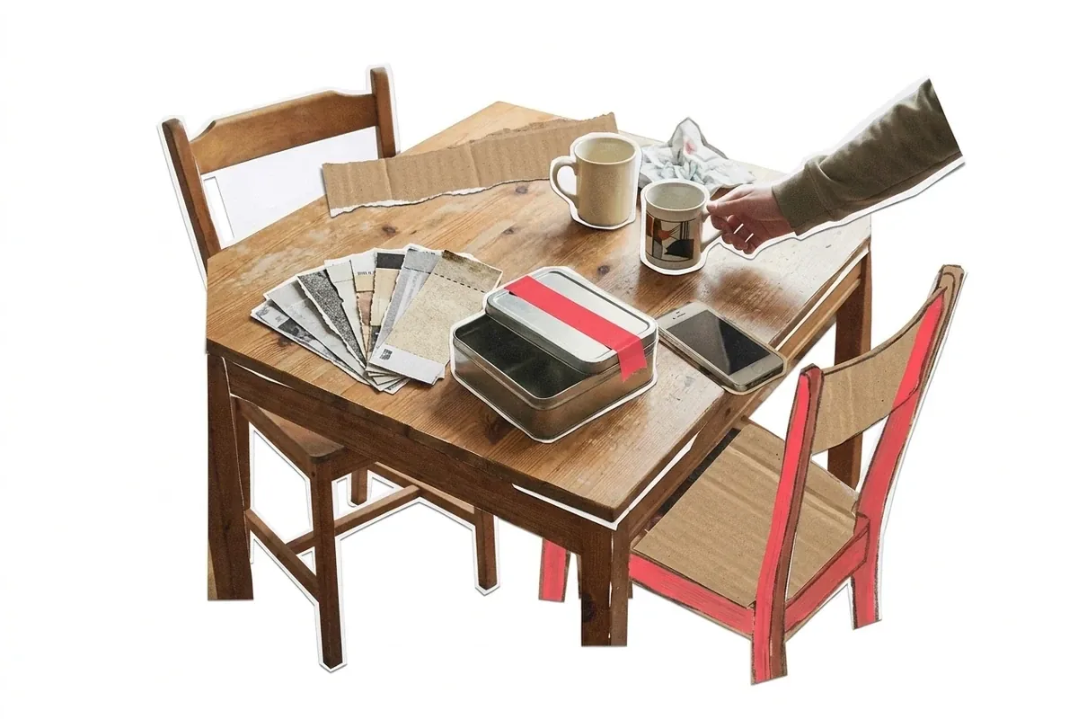 A kitchen table the morning after a night, with torn ticket stubs fanned across it
